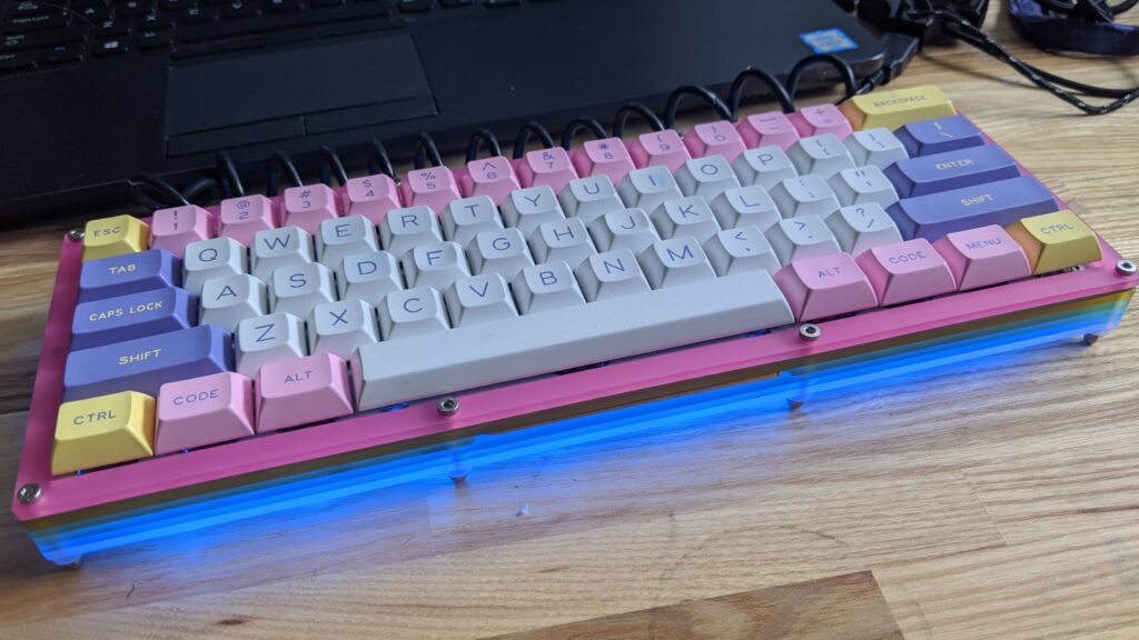 Laser cut keyboard case made from stacked acrylic.